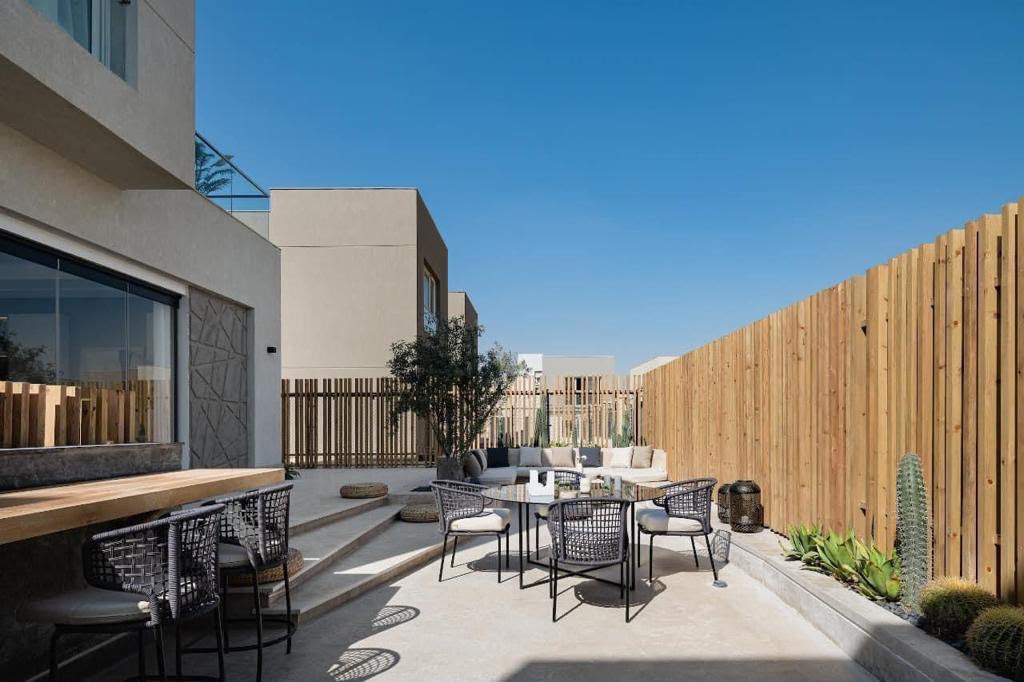 Private terrace — An outdoor terrace with seating and planting.