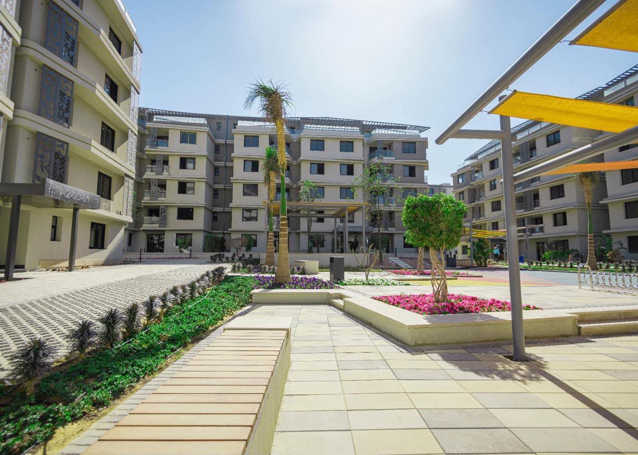 Apartment courtyard — A landscaped courtyard between apartment buildings.