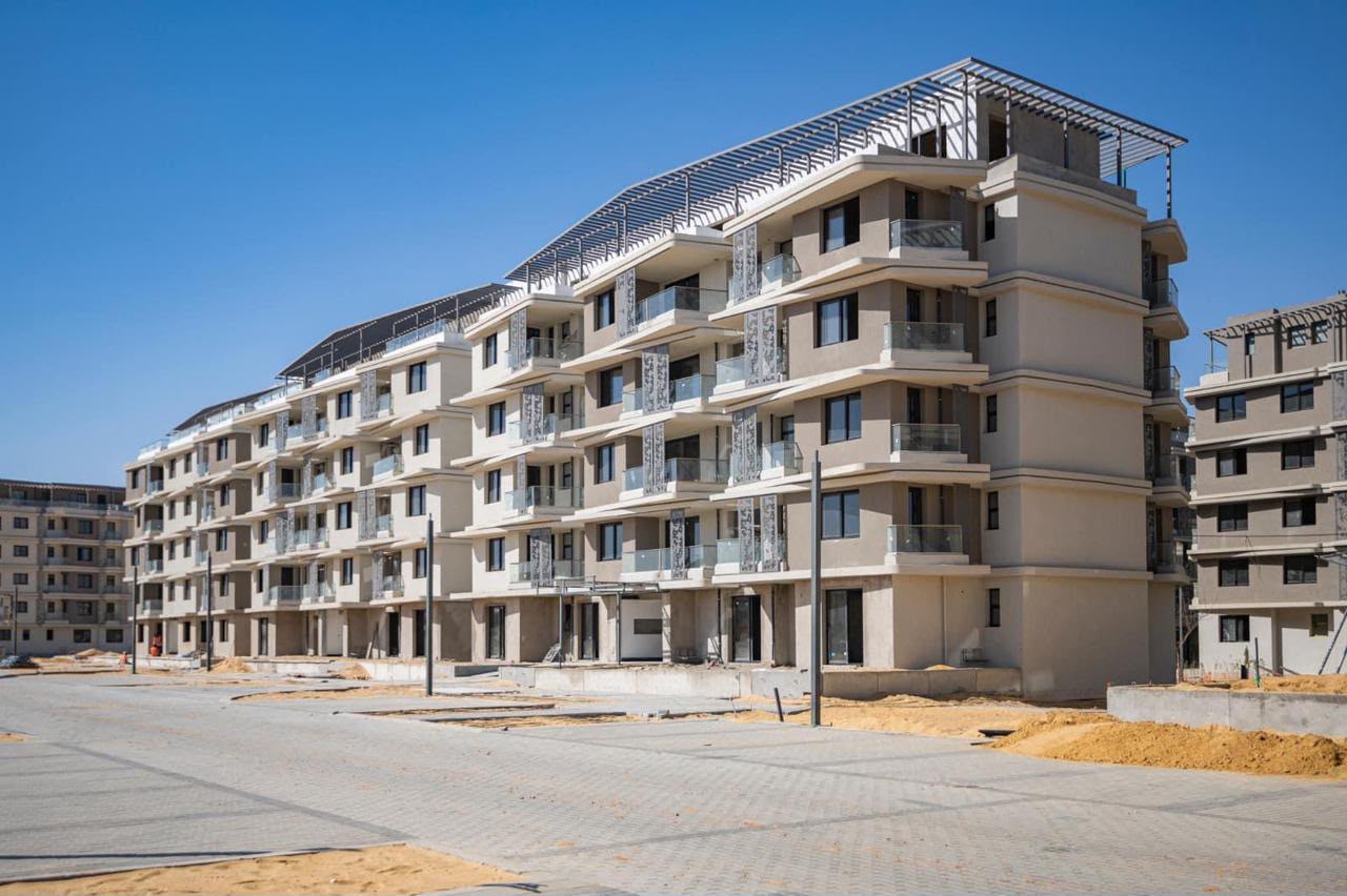Apartment buildings — Apartment blocks with terraces and decorative screens.